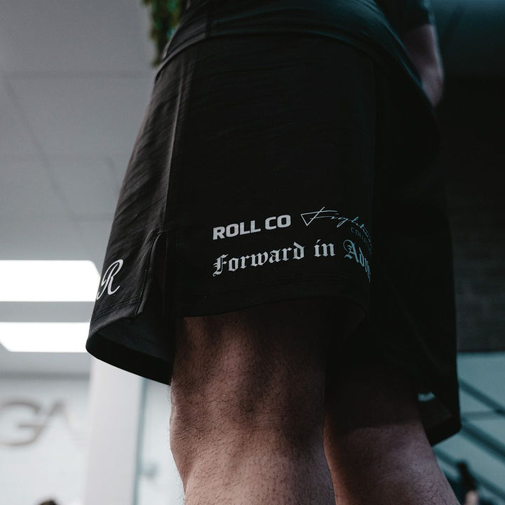 Black Roll Co BJJ MMA shorts with white R logo - Standing 1